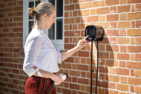 Lady using Luma Home Pro Ev Charger